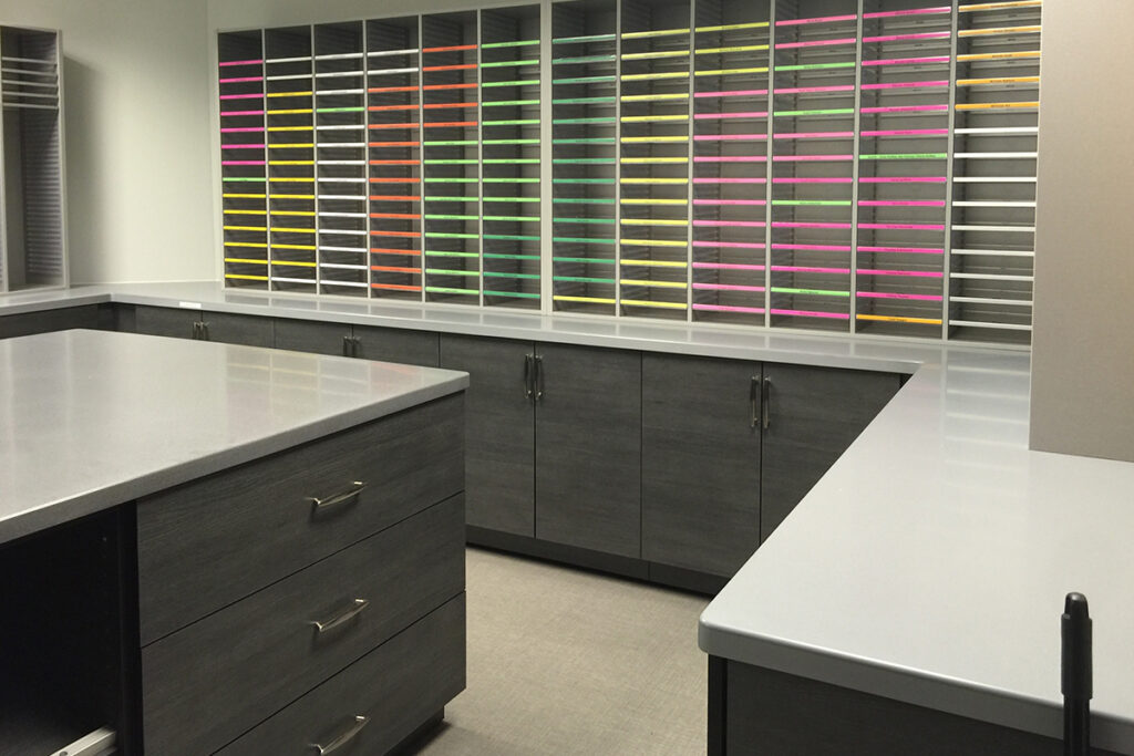 Color Coded Mail Sorters with Solid Surface Base Cabinets - Mailroom Casework