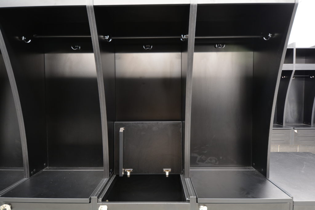 Locker Room with black laminate lockers with hanging rod, hooks, and bench storage
