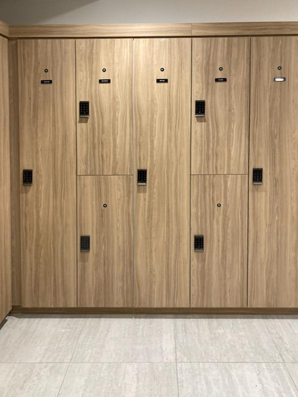 Woodgrain lockers with battery powered locks and name tags with full length lockers