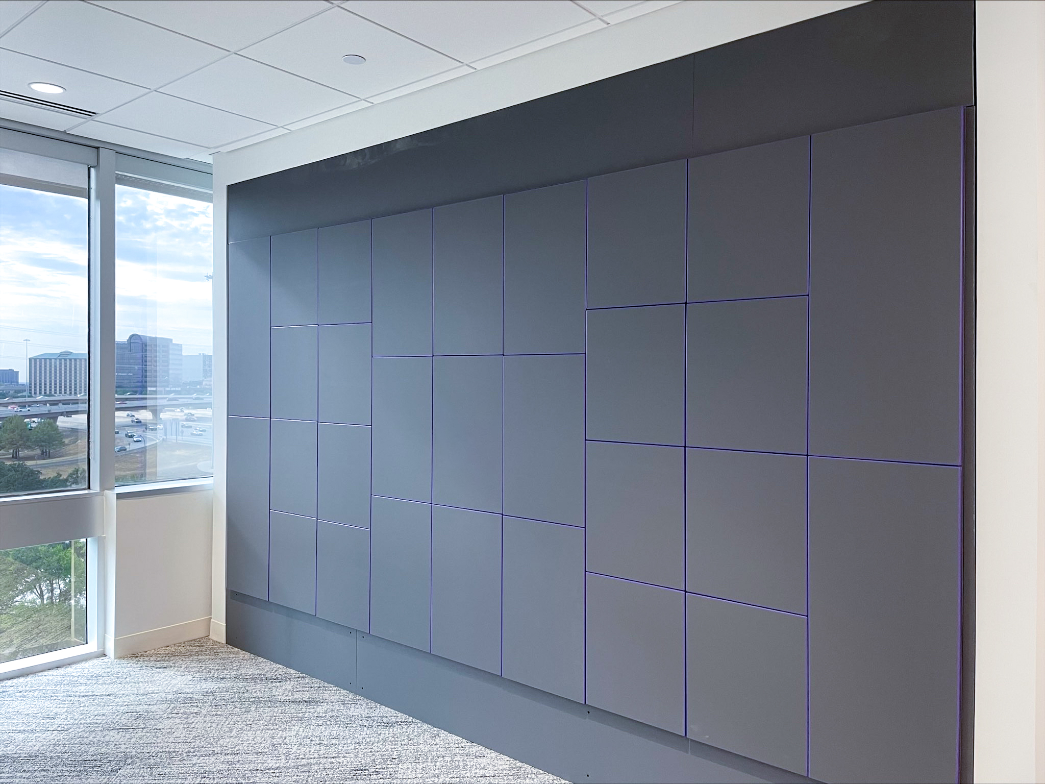 347 premium workplace lockers with Wilsonart Traceless HPL doors and violet edge banding for global insurance company in Dallas, Texas