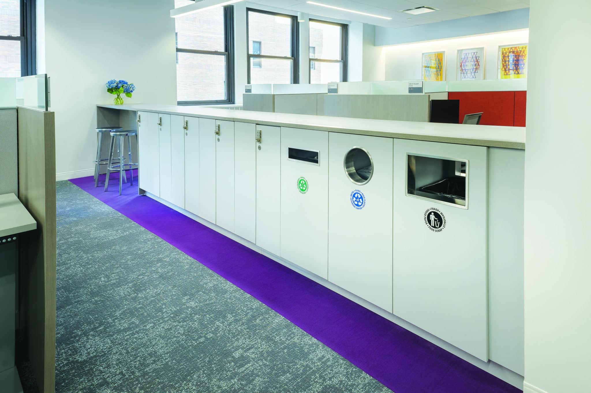 Hospital administration casework by HAMILTON — counter-height locker and huddle countertop system
