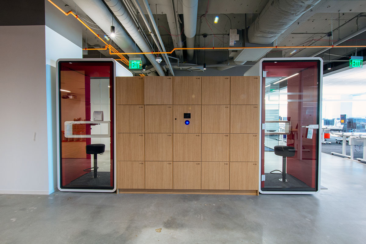 Zone divider locker wall in open office by HAMILTON Casework Solutions